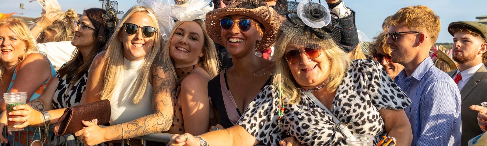 Crowd of racegoers at Ffos Las Racecourse