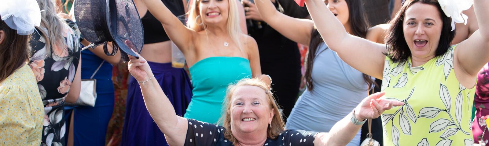 everal ladies enjoying the live entertainment at Ffos Las races