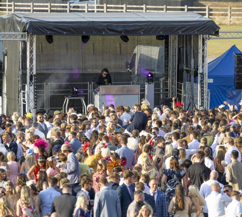 The crowd and the stage at Ffos Las Racecourse