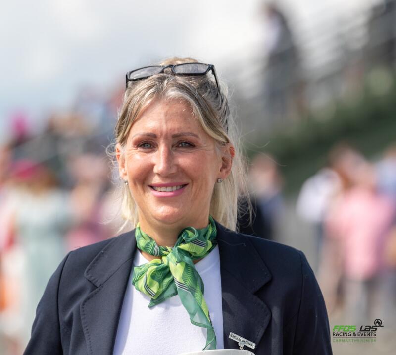 A member of staff at Ffos Las Racecourse smiles for the camera