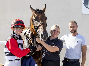 Jockey, trainers and horse at ffos las 